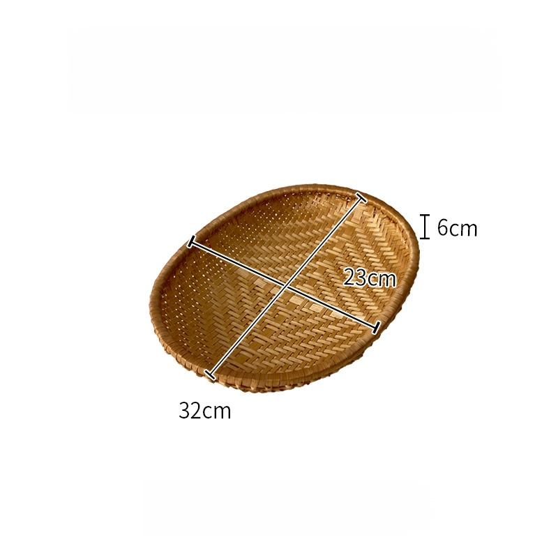 竹で編んだスモークグレーの楕円形バスケット