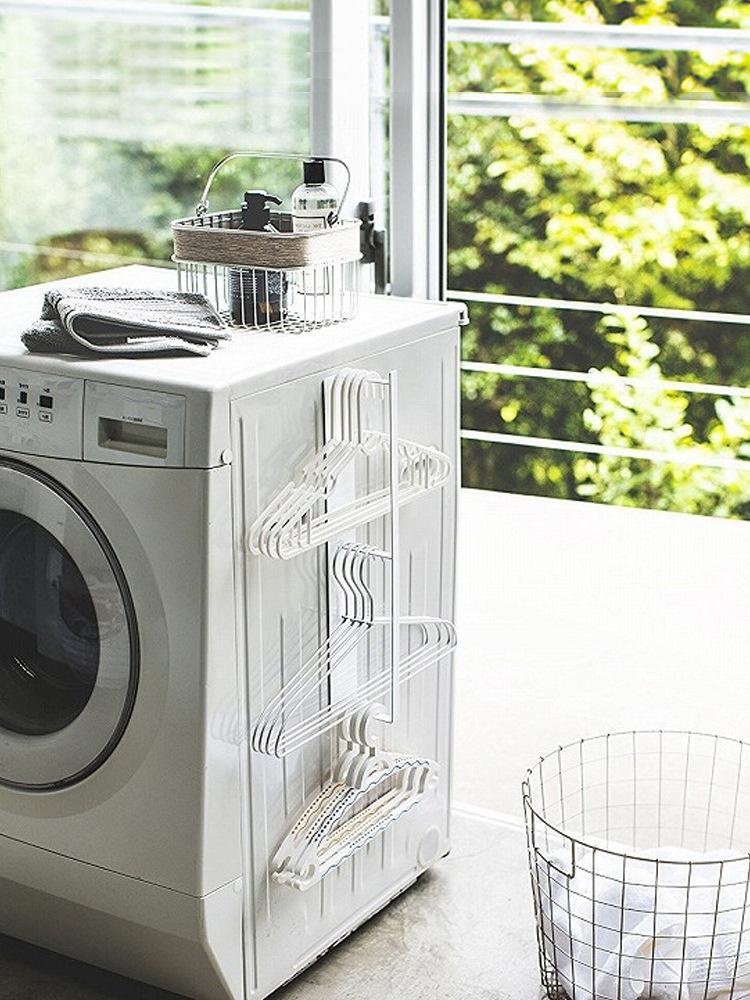 Magnetic washing machine side rack for hanger storage