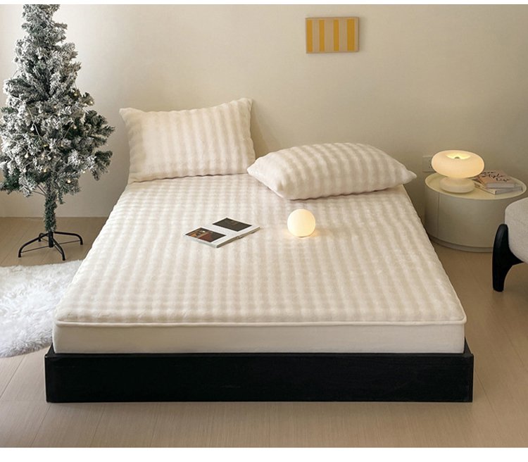 Dormitorio acogedor con ropa de cama de terciopelo burbuja