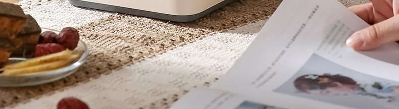 Vista lateral del hervidor multifunción con tapa de acero inoxidable