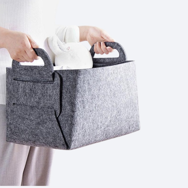 Foldable felt hand-held storage basket for miscellaneous items