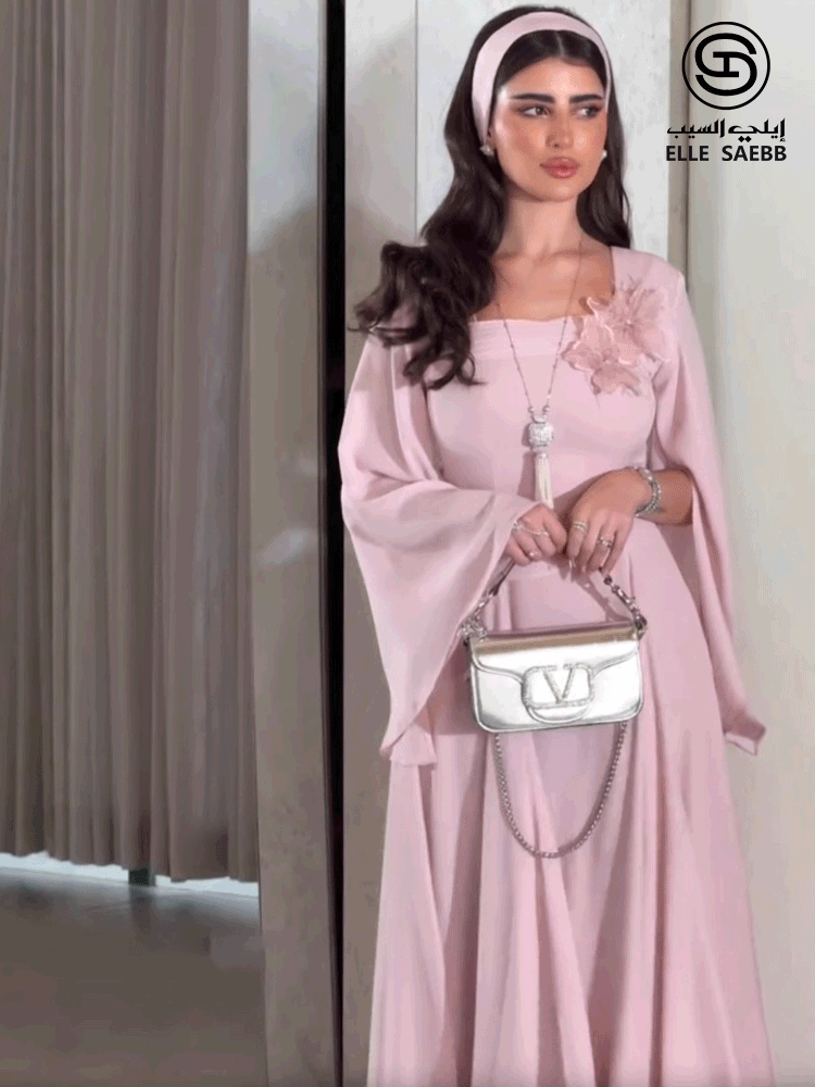 فستان أنيق وعصري بلون موحد مع خصر مشدود