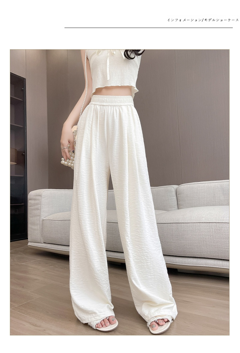 シンプルで上品なクリーム色の多用途パンツ
