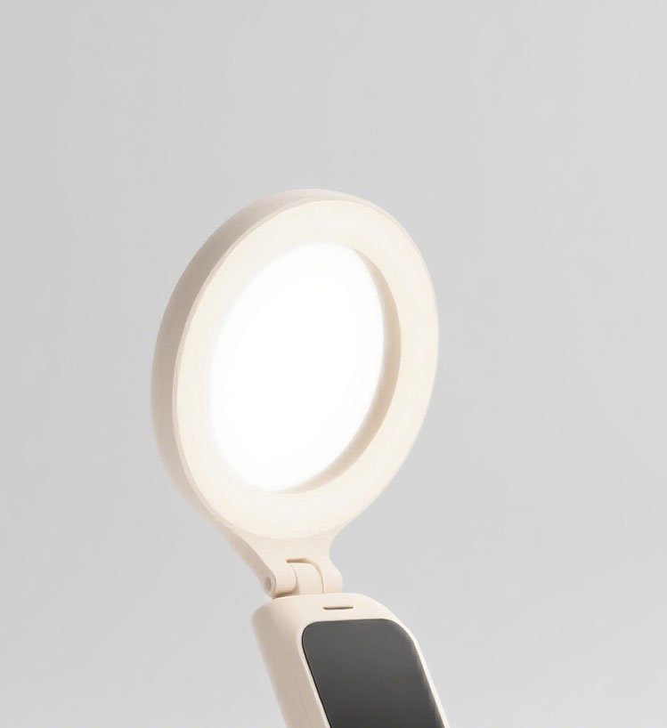 Multifunkční skládací světlo na přisvětlení v mléčně bílé barvě