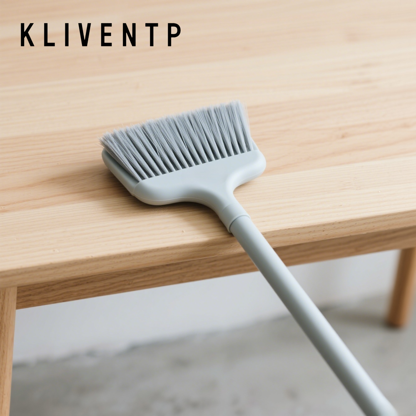 Small soft-bristled broom for gentle cleaning