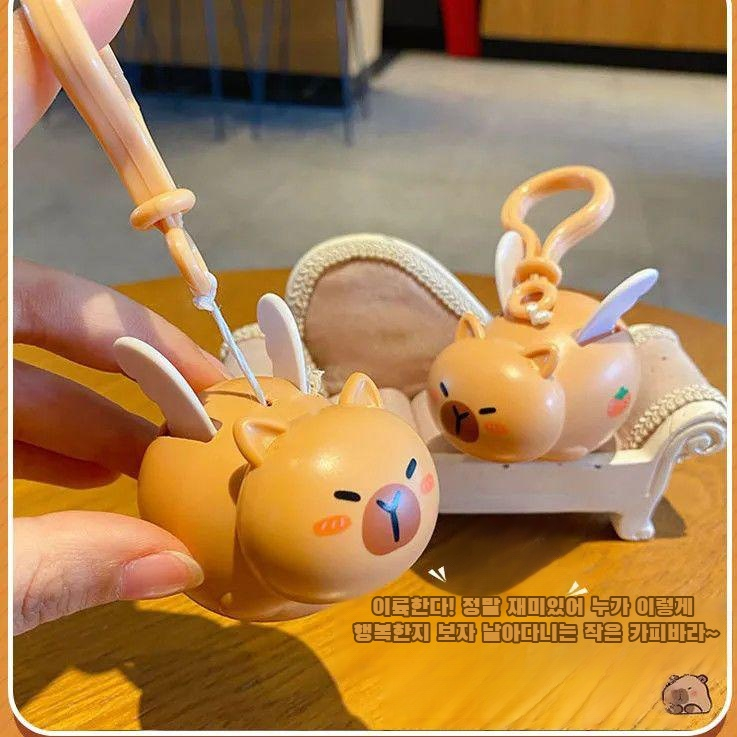 날 수 있는 카피바라 돌고래 토이 키링 비주얼 장신구 재미있고 활동적입니다.