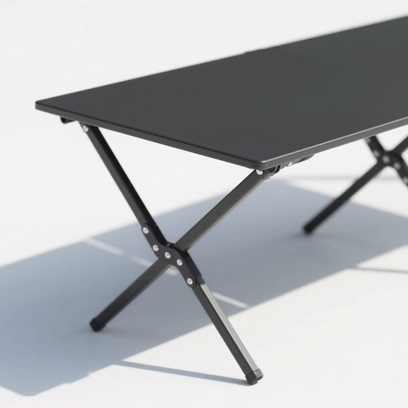 Detalle de la mesa plegable de aluminio portátil