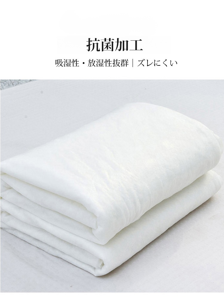 ベッドに敷かれた夏用冷感掛け布団