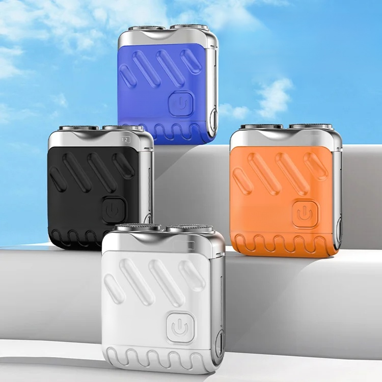 Rotary double ring electric shaver