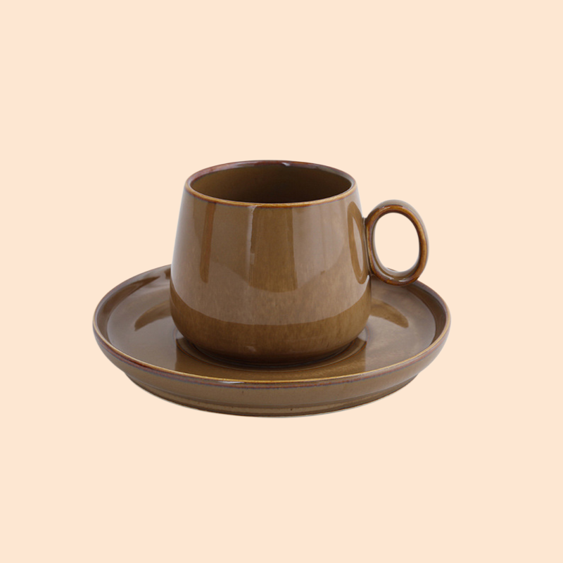 Kiln-changed coffee cup and saucer set