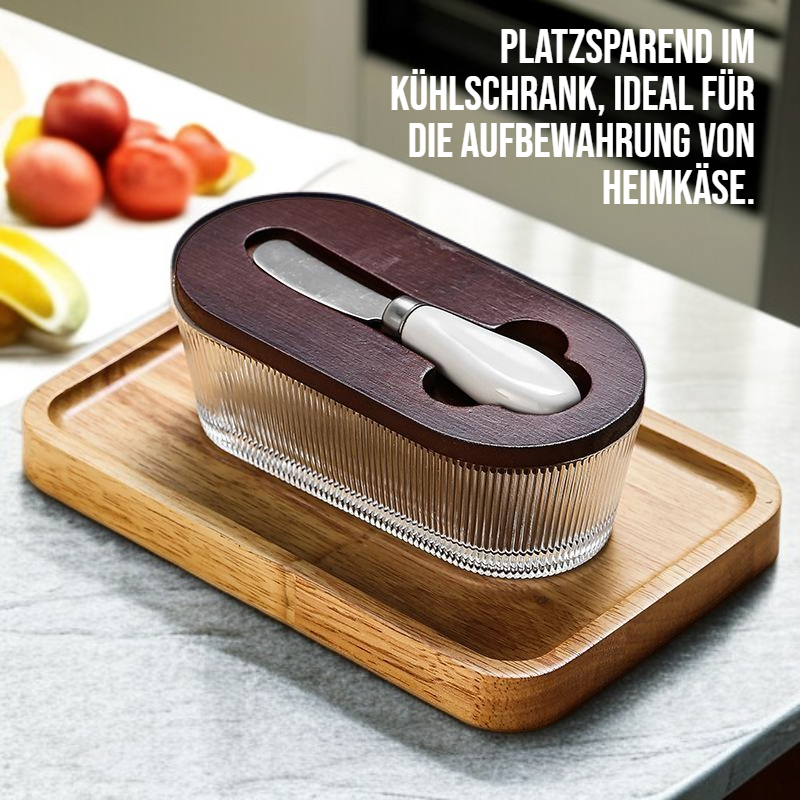 Rechteckige Heimkäsekonservierung mit Deckel und Spachel