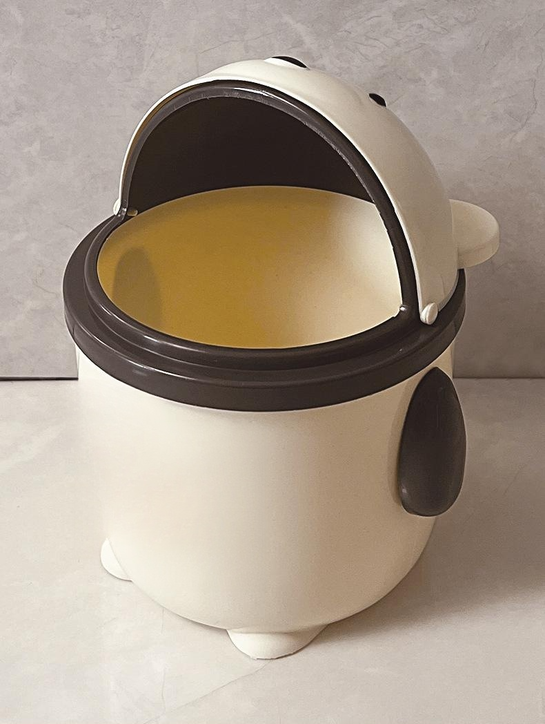 Spacious cream storage bin for desktop essentials