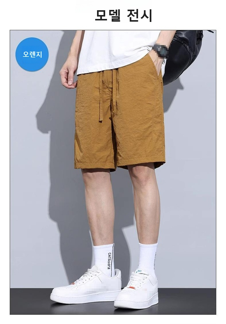 스포티한 남성 반바지 착용 예시