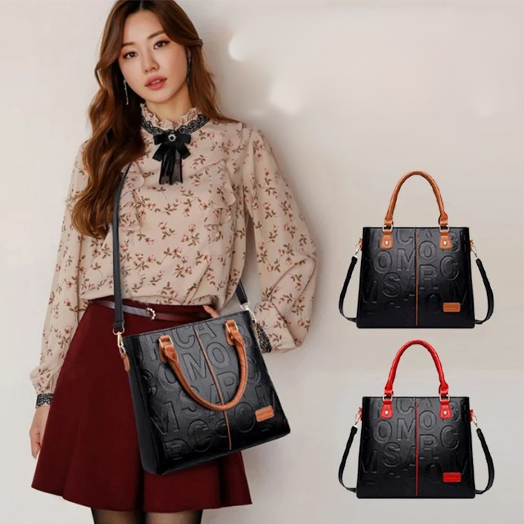 스타일리쉬 앰보 핸드백