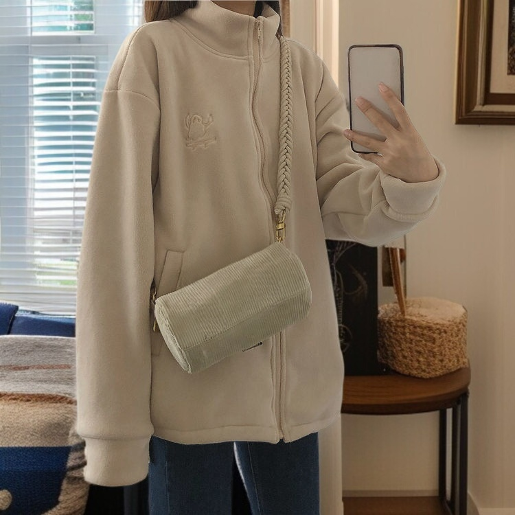 Model wearing women's thick winter coat outdoors