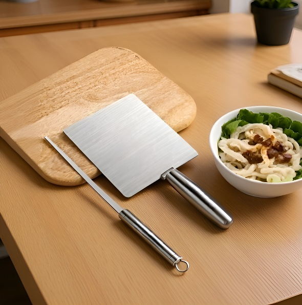 Heavy duty meat scraper cutting raw meat