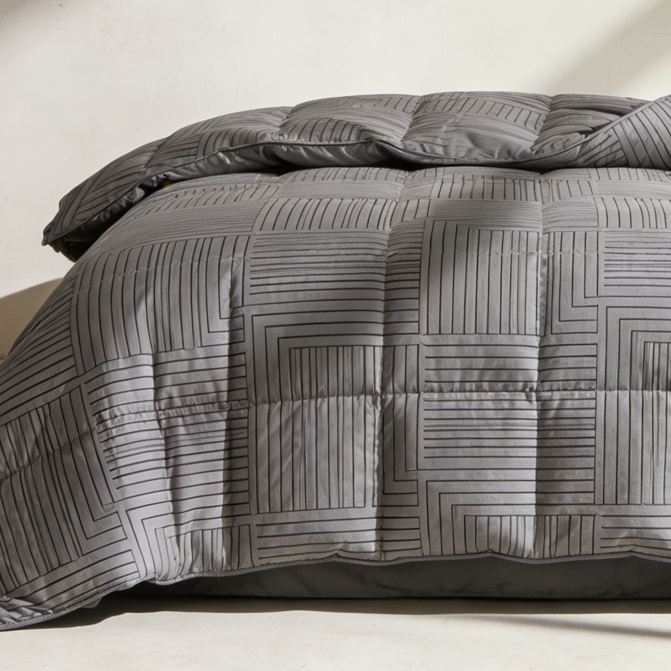 Detalle de la textura suave del edredón de algodón puro