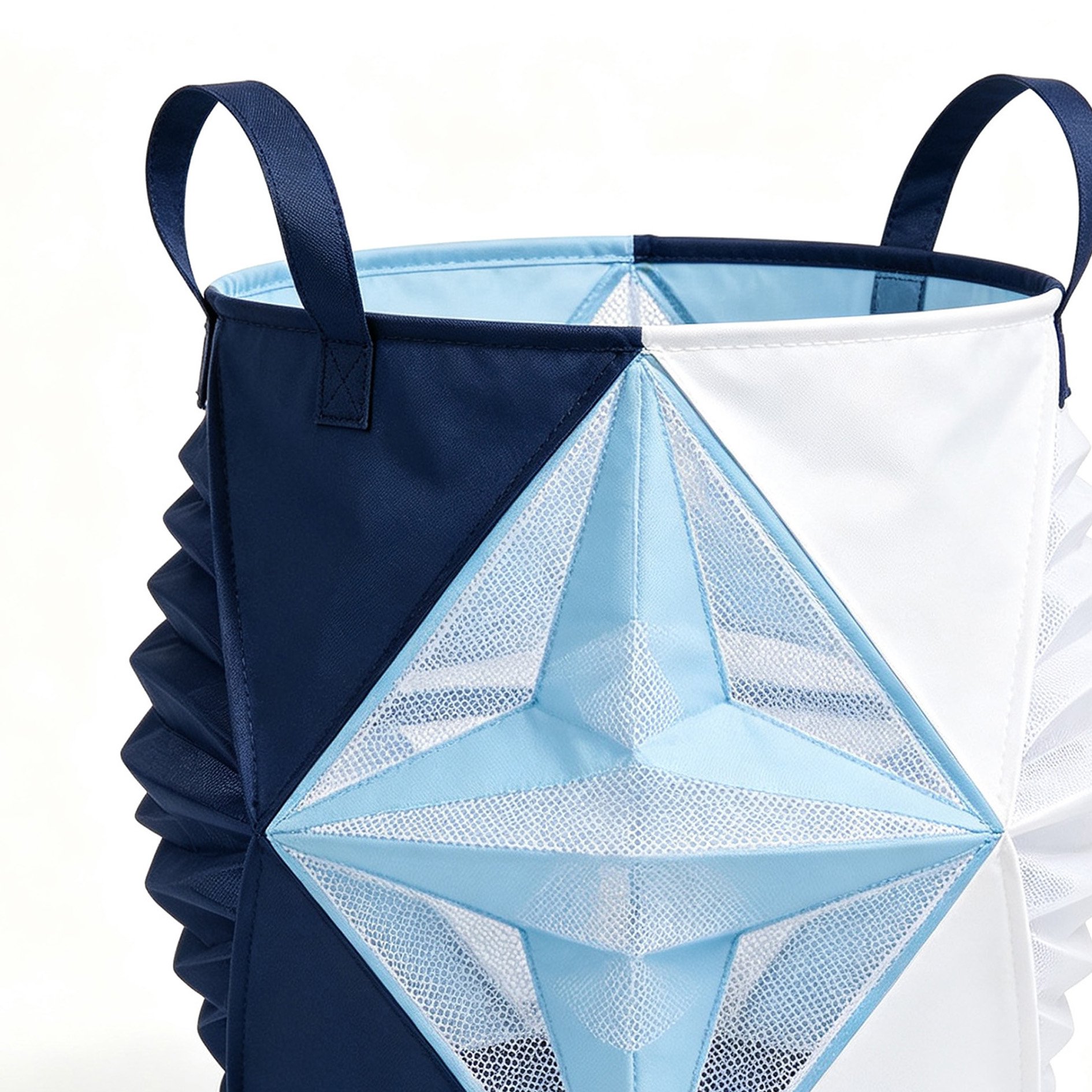 Close-up of star pattern on fabric laundry storage bucket