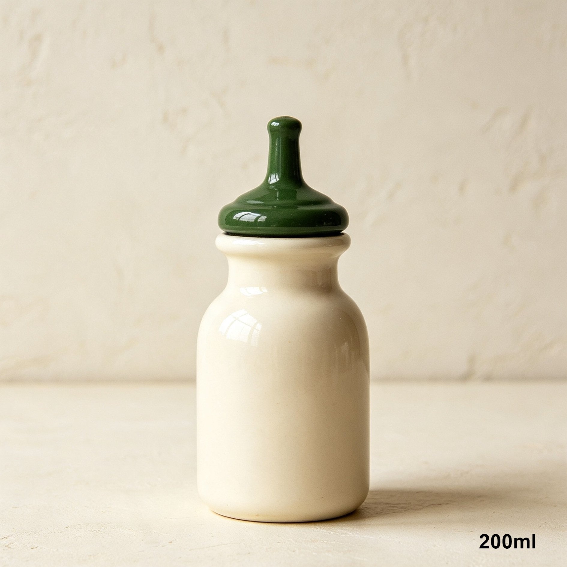 Hand pouring dressing from an enameled condiment bottle
