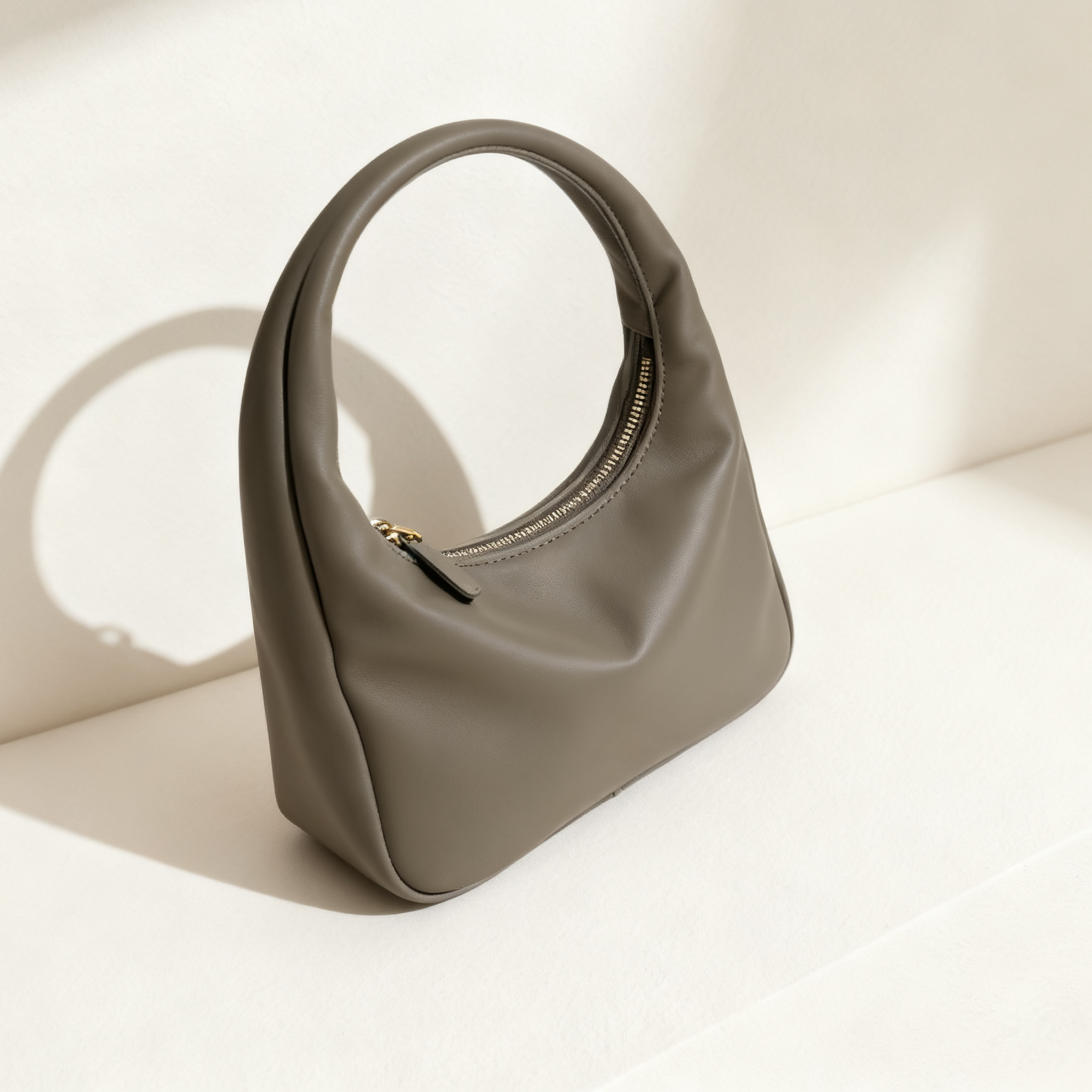 กระเป๋าทรงวงกลมหนังแท้สำหรับผู้หญิง