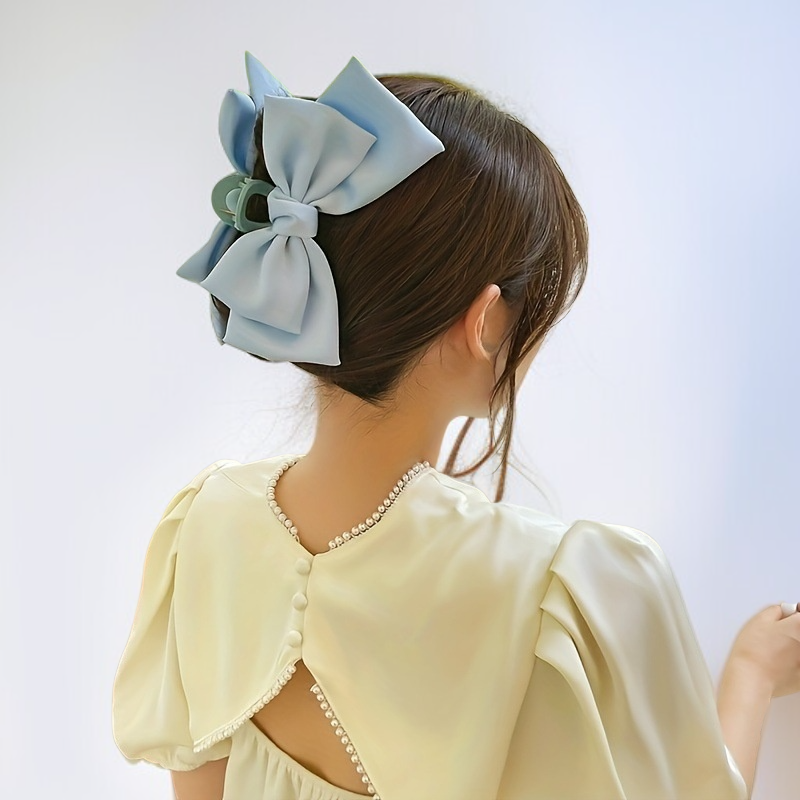 Detalle del clip de garra en forma de arco