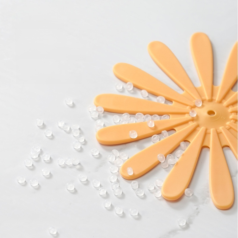 Odnímatelná podložka pod hrnec ve tvaru sedmikrásky