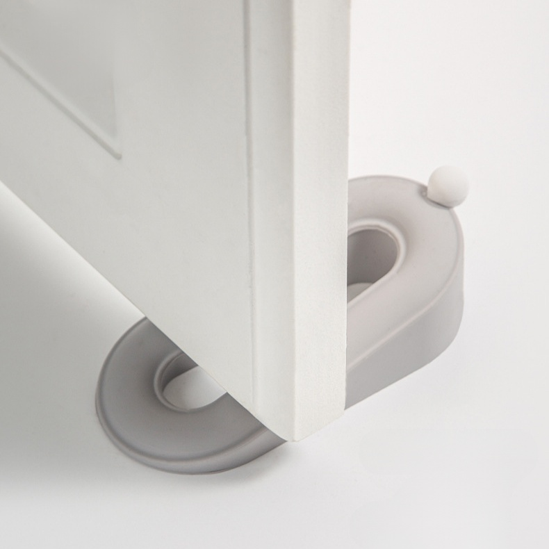 Tope de puerta en forma de dona, portátil y fácil de almacenar