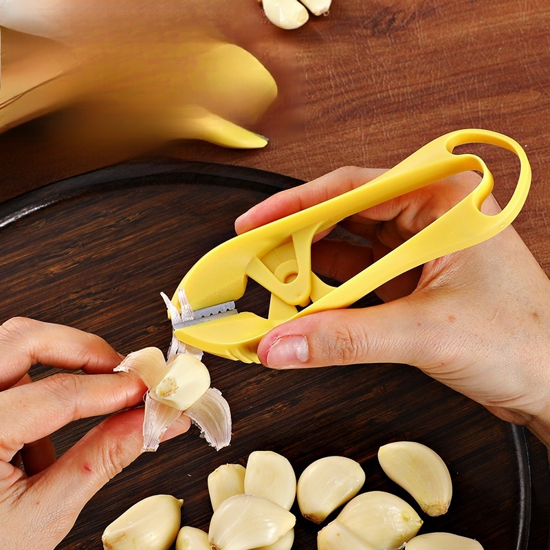 Stainless steel garlic peeler