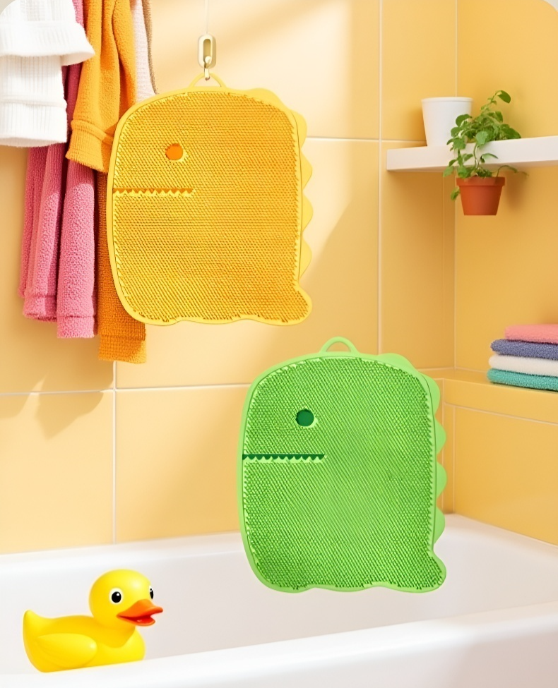 Close-up of dinosaur design on massage foot mat