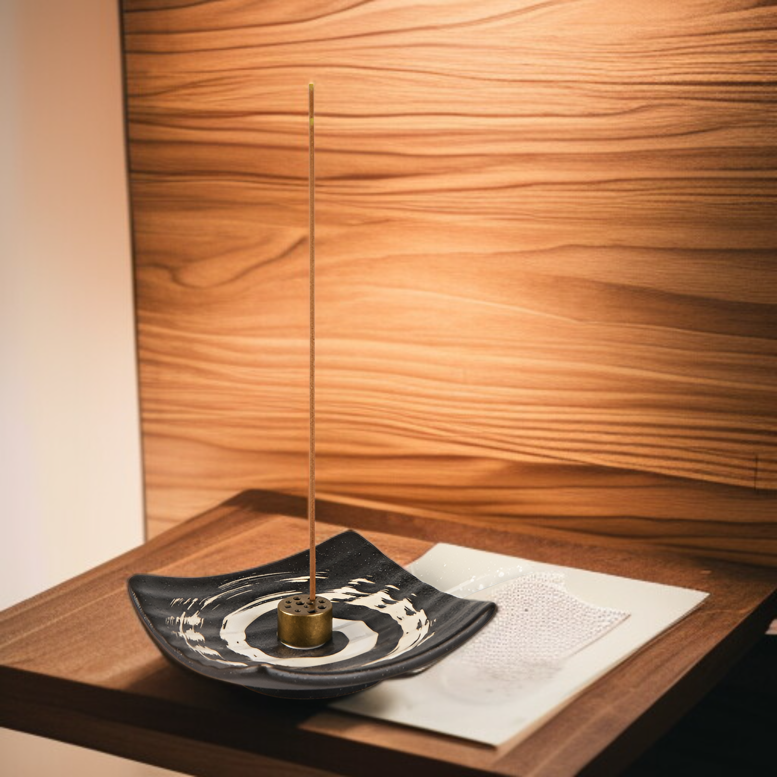 Close-up of rustic Japanese pottery incense dish