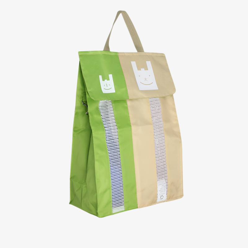 Hands placing plastic bags into the organizer bag