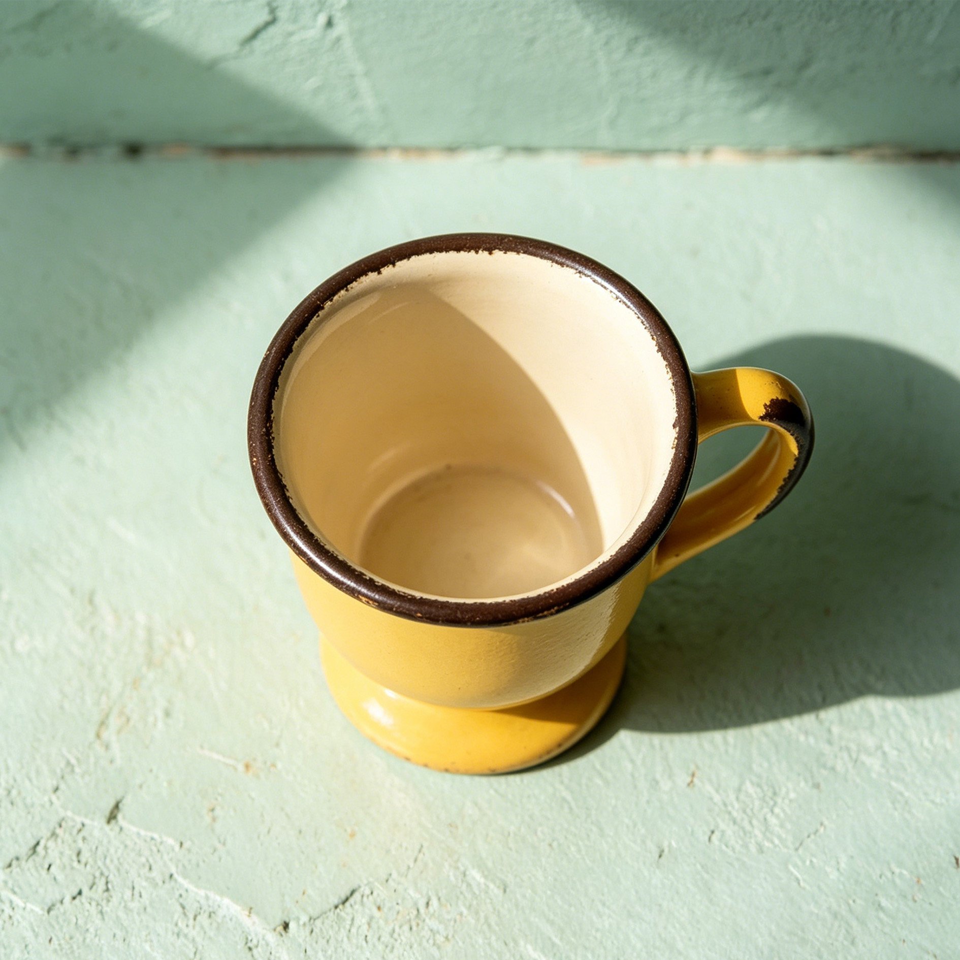 Close-up of retro enamel espresso mugs with classic design