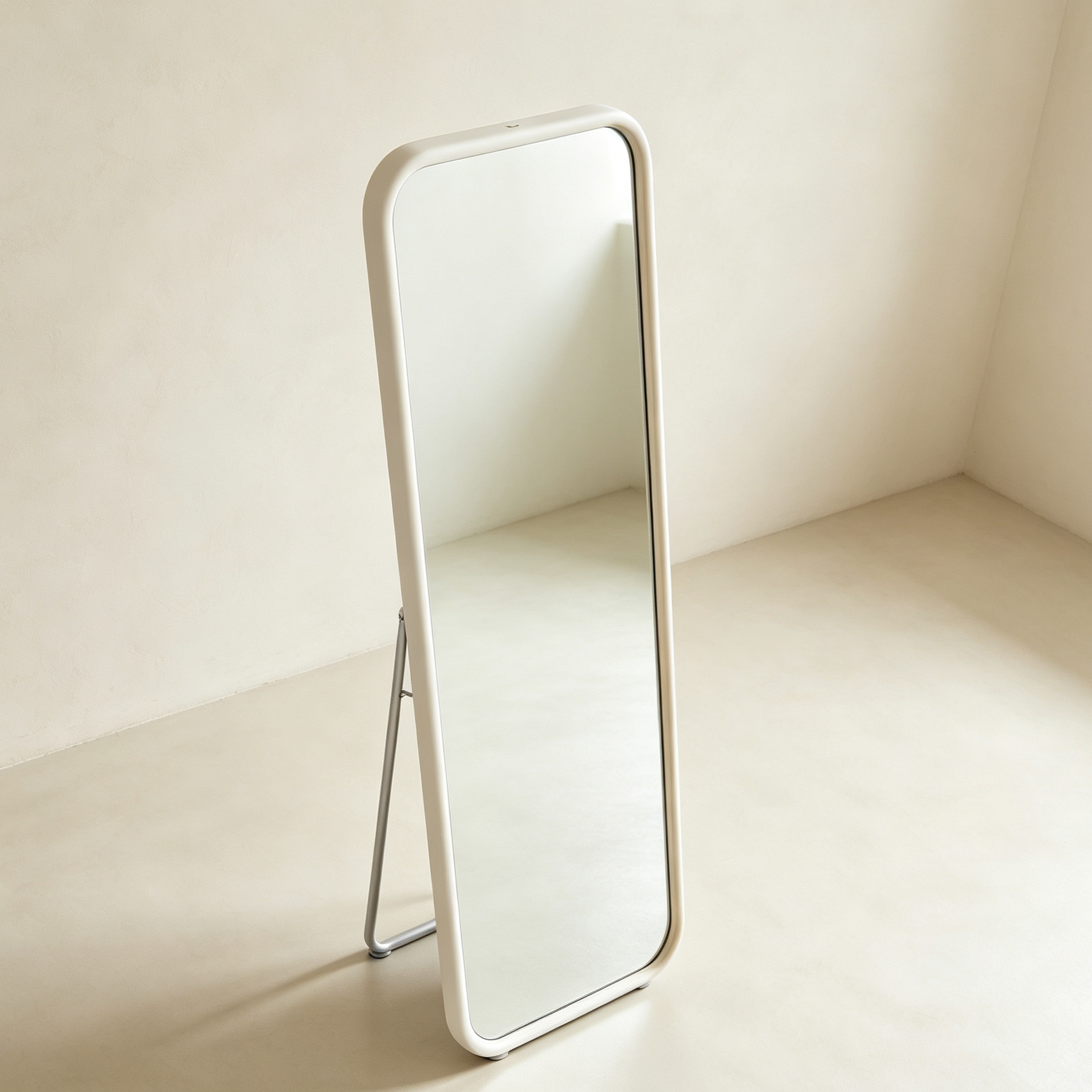 Elegant floor mirror reflecting a spacious living room interior