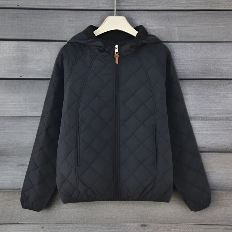 Detail of hooded design on women's winter jacket 2025