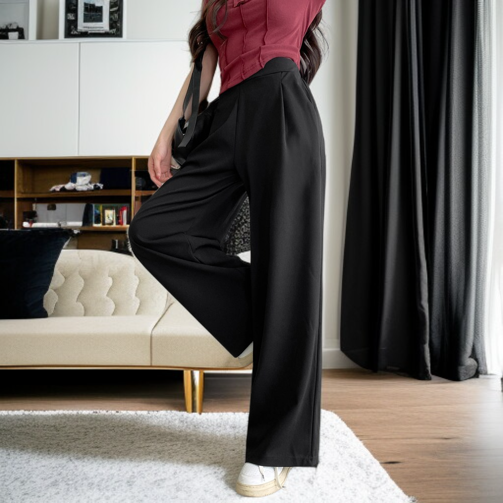 Schmal geschnittene, weit geschnittene Damenhose mit hohem Bund und schmeichelhaftem Fall.
