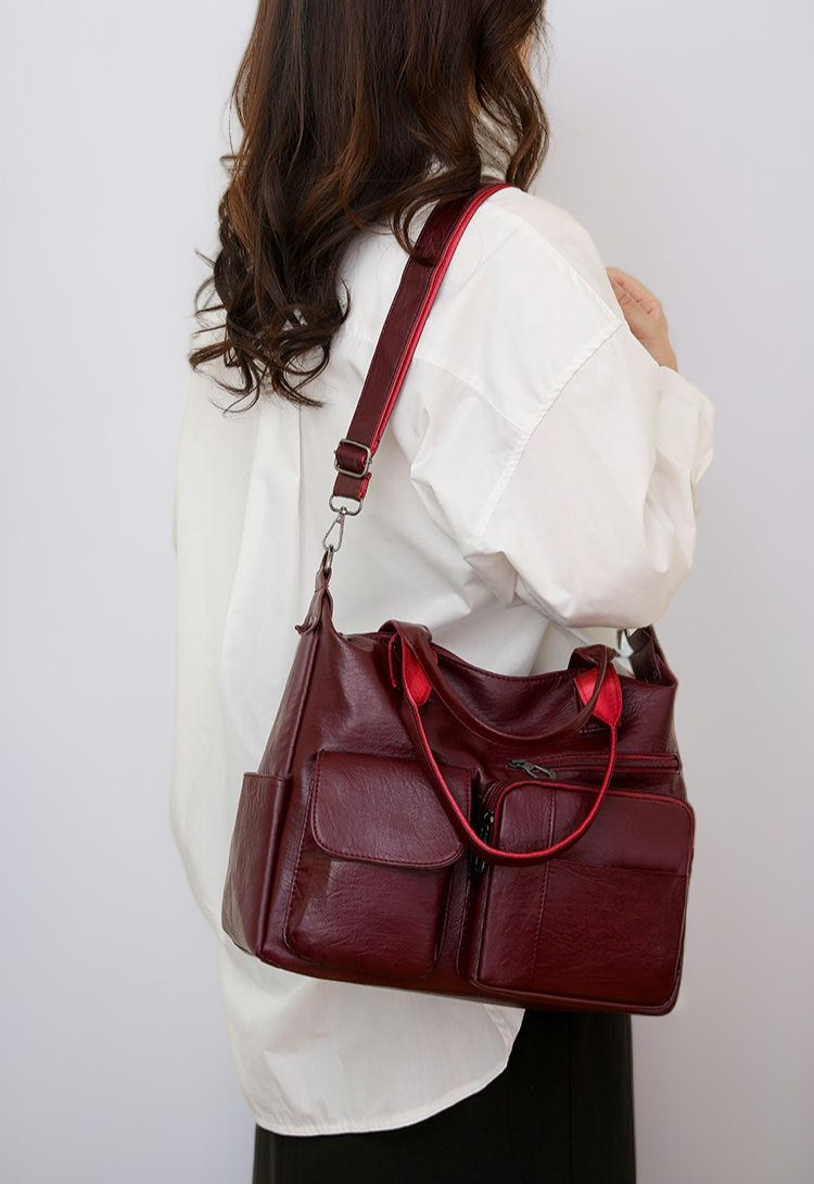 حقيبة كروس نسائية مع إكسسوارات معدنية