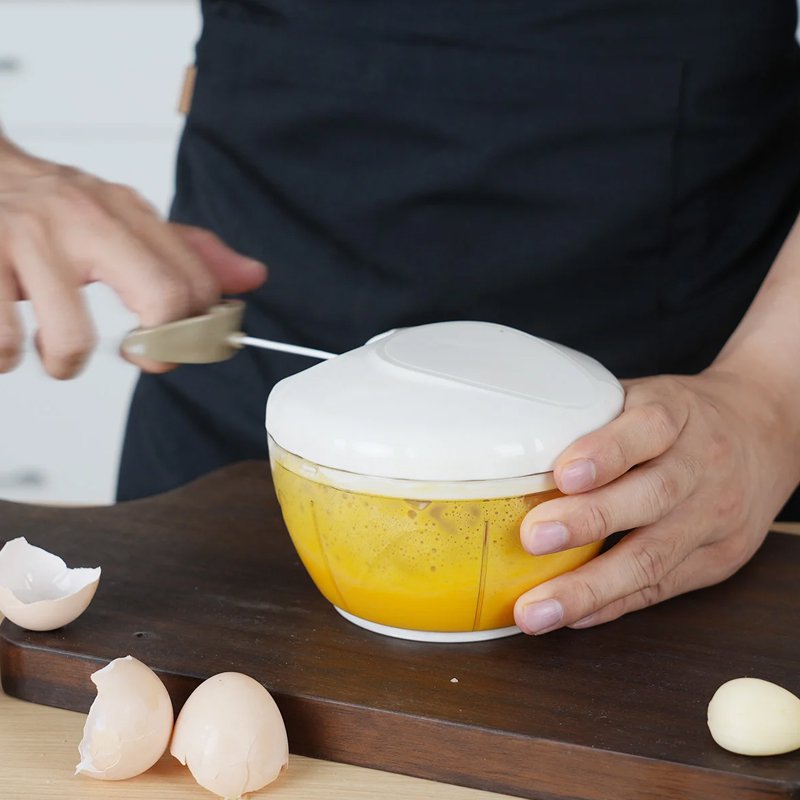 Hacheur à cordon manuel