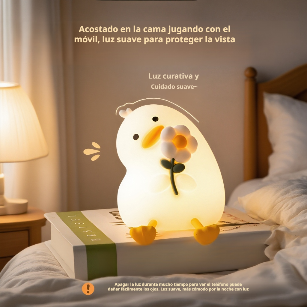 Luz cálida de noche en forma de pato con flores