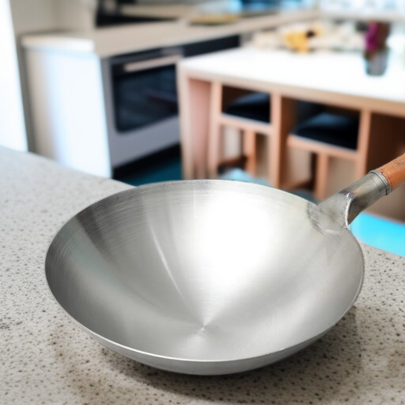 وعاء طهي حديدي تقليدي مصنوع يدويًا بدون طلاء، غير لاصق وخفيف الوزن، مناسب لموقد الغاز 