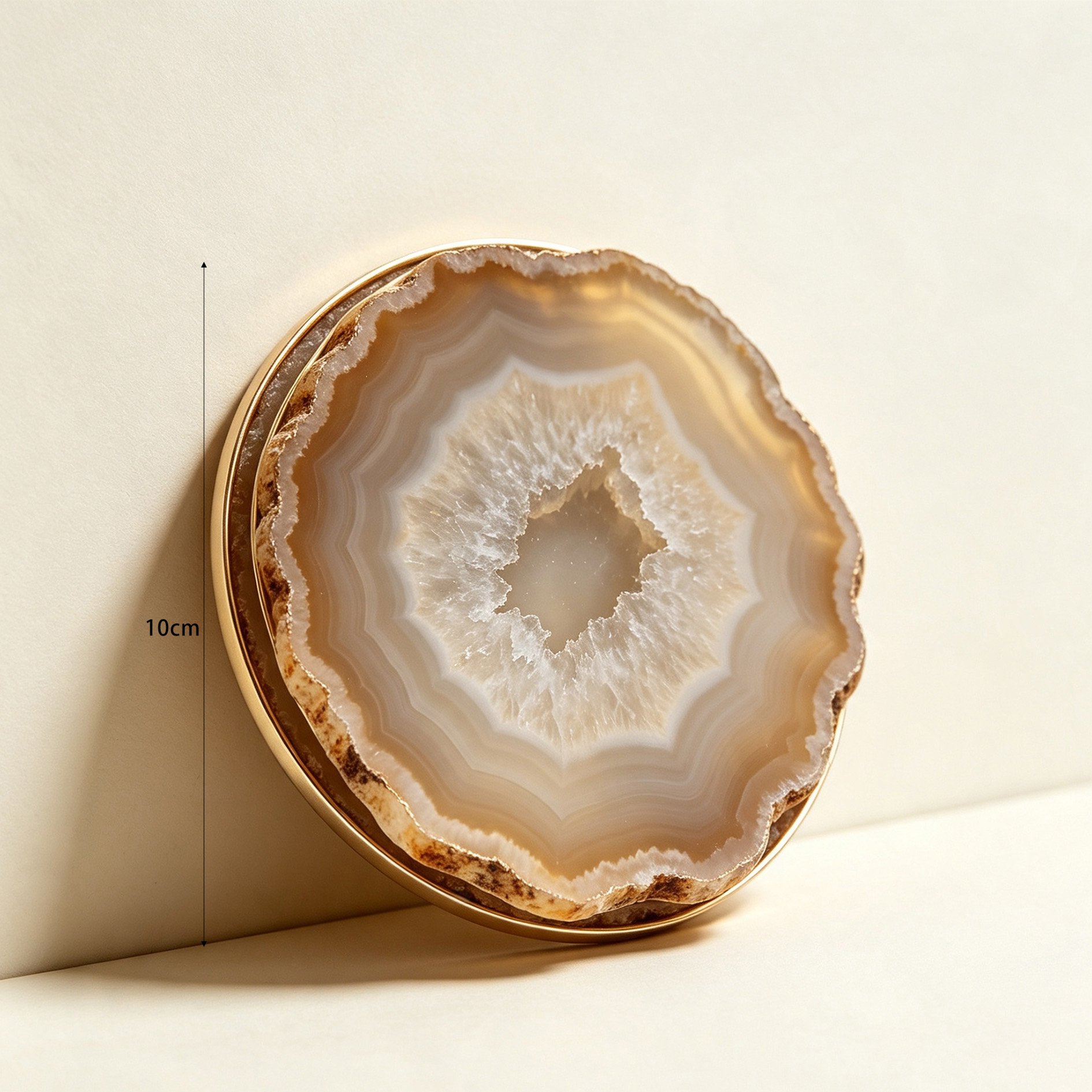 Elegant drinkware resting on agate gold-rimmed coaster