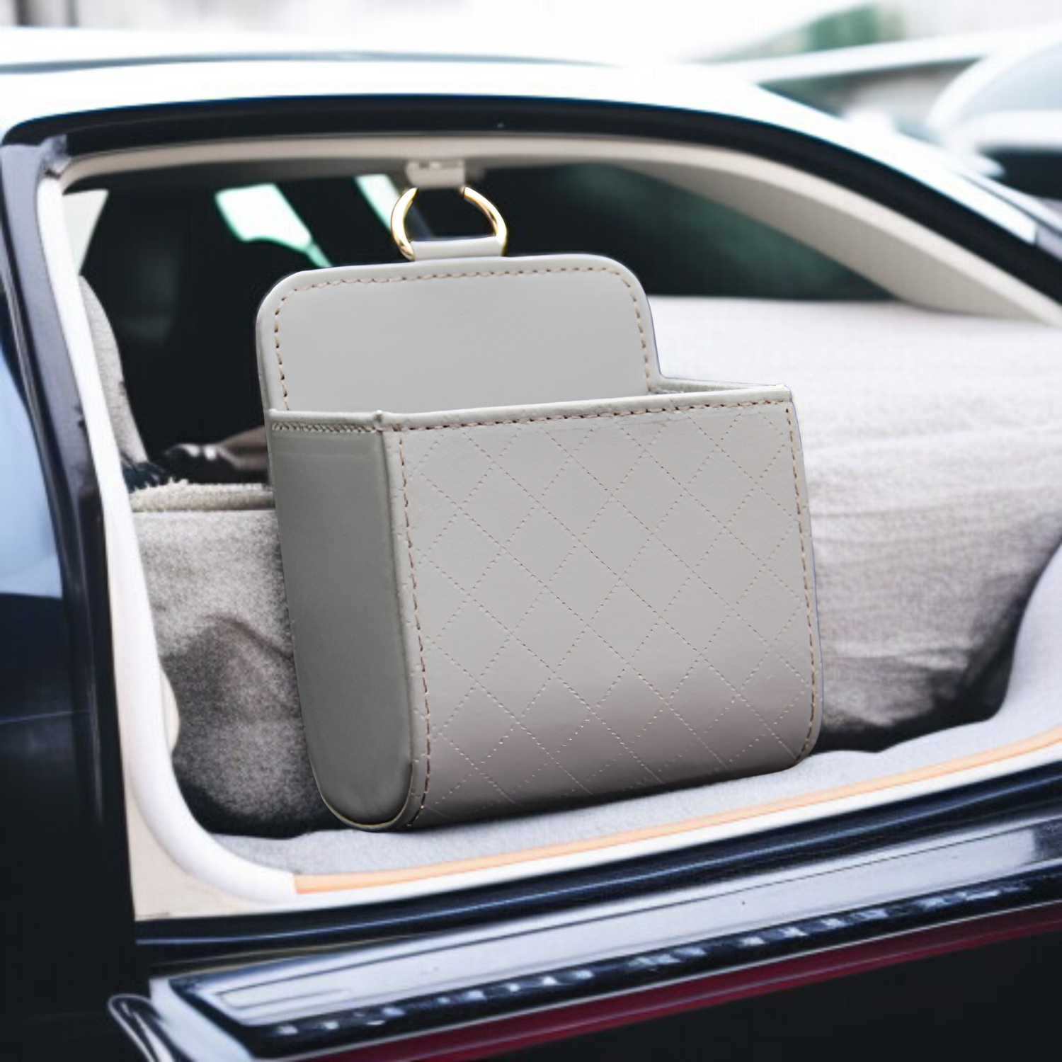 Compact car storage pocket for keys and small items