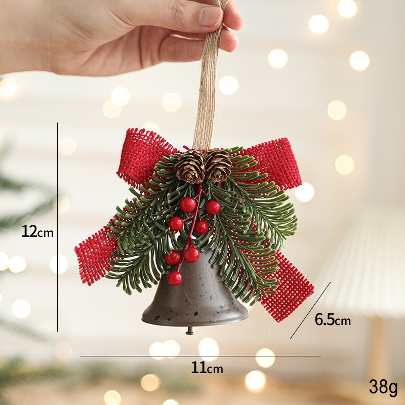 Holiday metal bell and bow ornament
