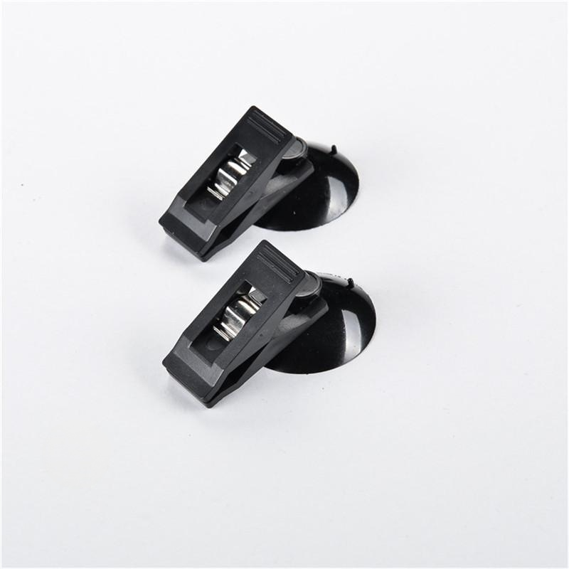 Popular in Japan and South Korea, this 2-pack multi-purpose portable car clipper/card holder/documen