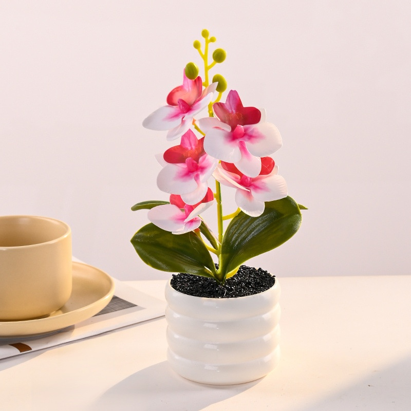 Arreglo de orquídea artificial en maceta