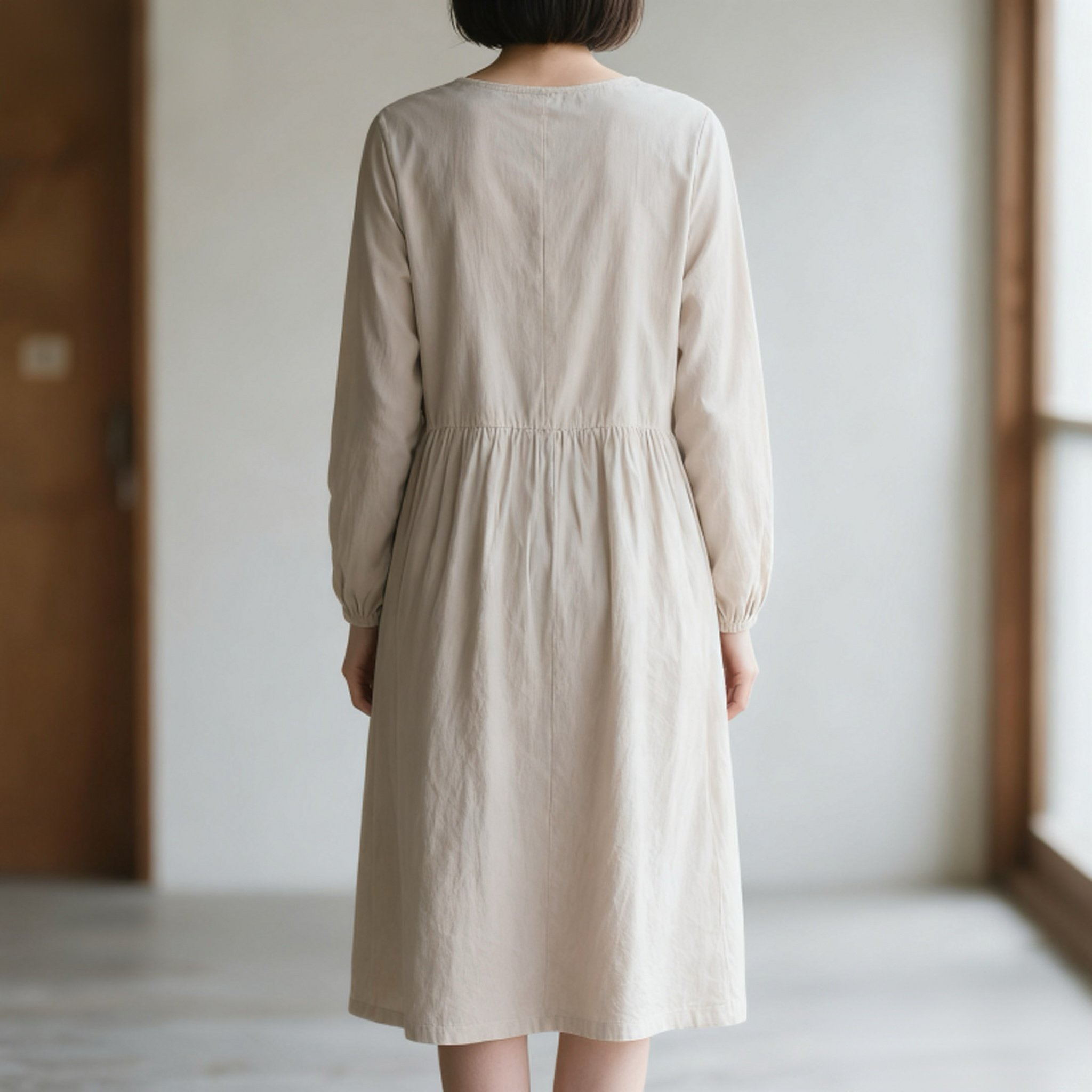 エレガントな女性が着用する気質の長袖ワンピース