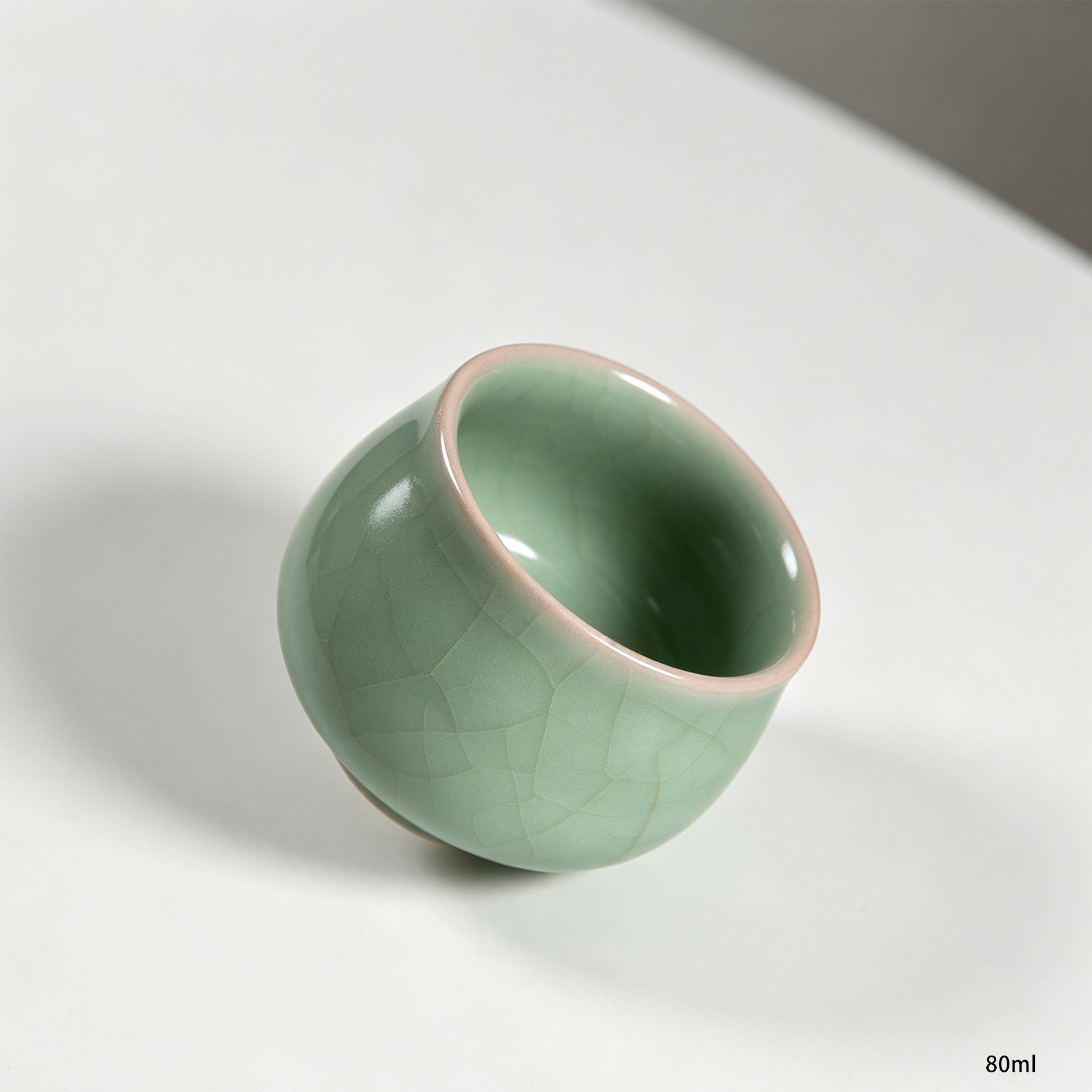 Elegant celadon teacup for gongfu tea ceremony