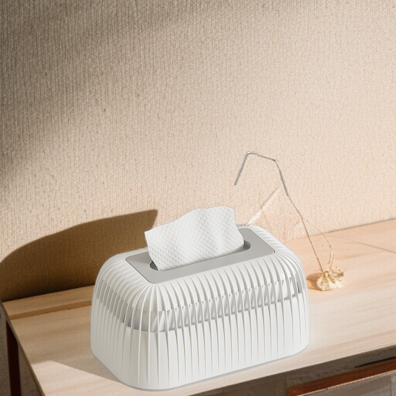 コーヒーテーブルに置かれたシンプルなティッシュボックス