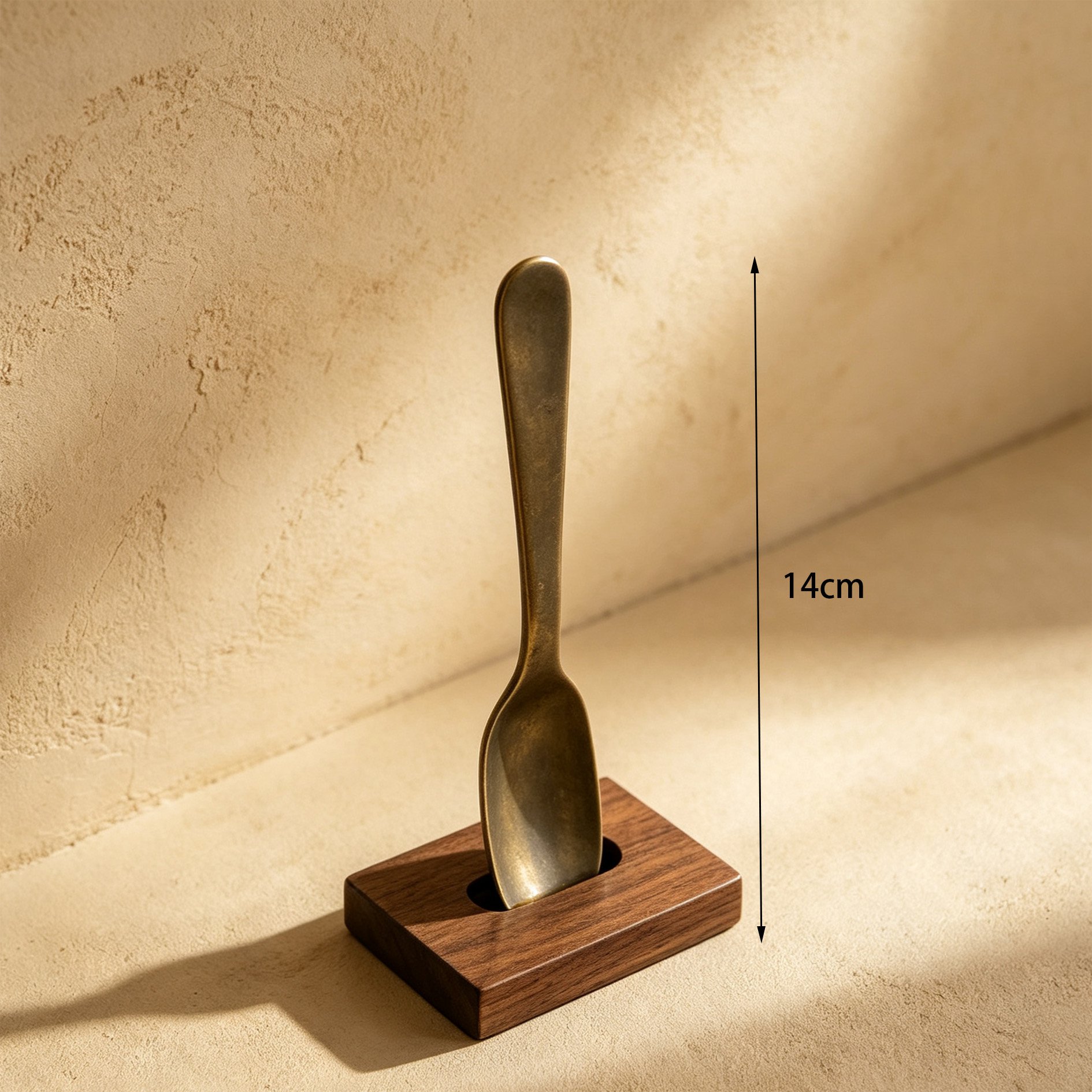 Brass spoons with ornate handles displayed together