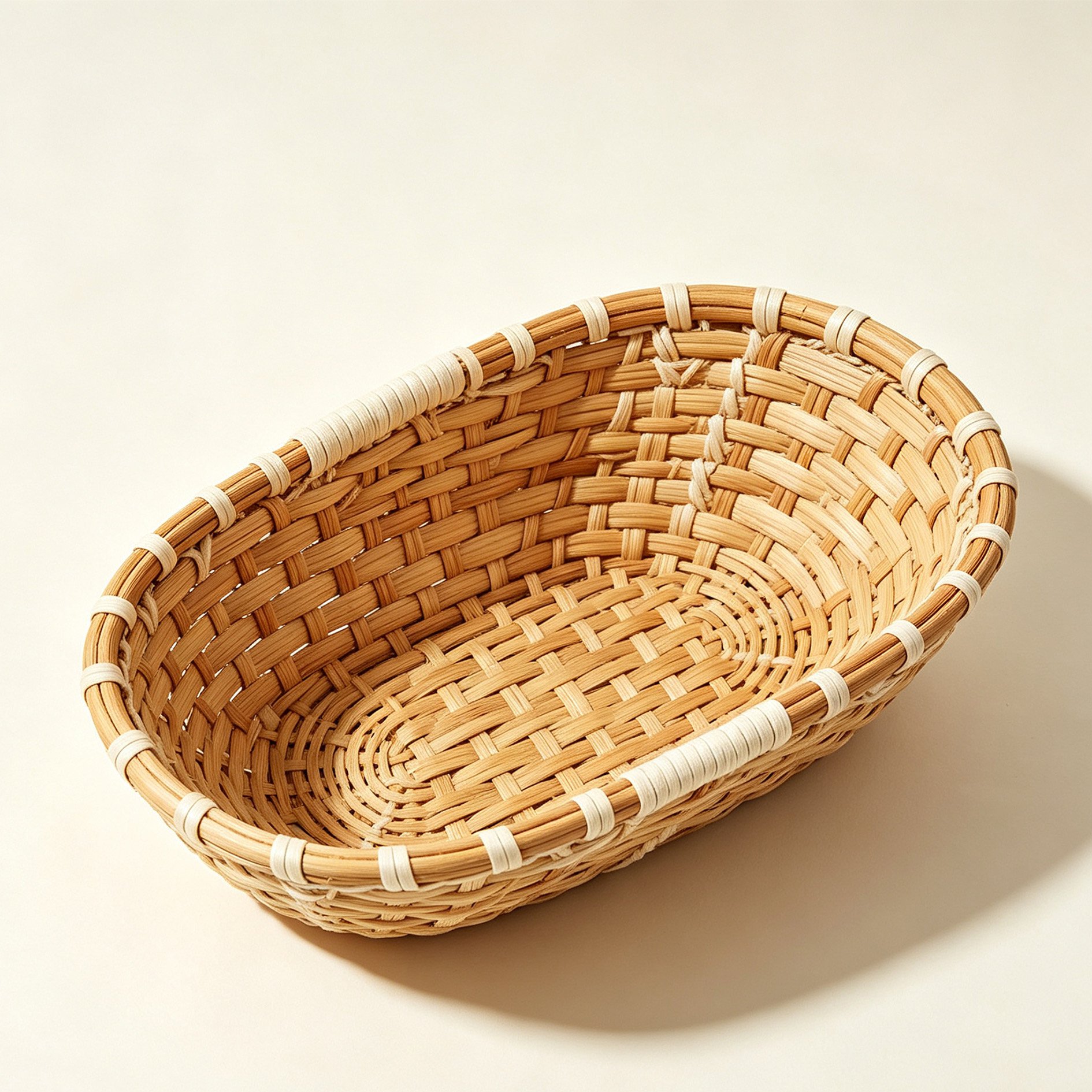 Oval woven storage basket made of raw wood