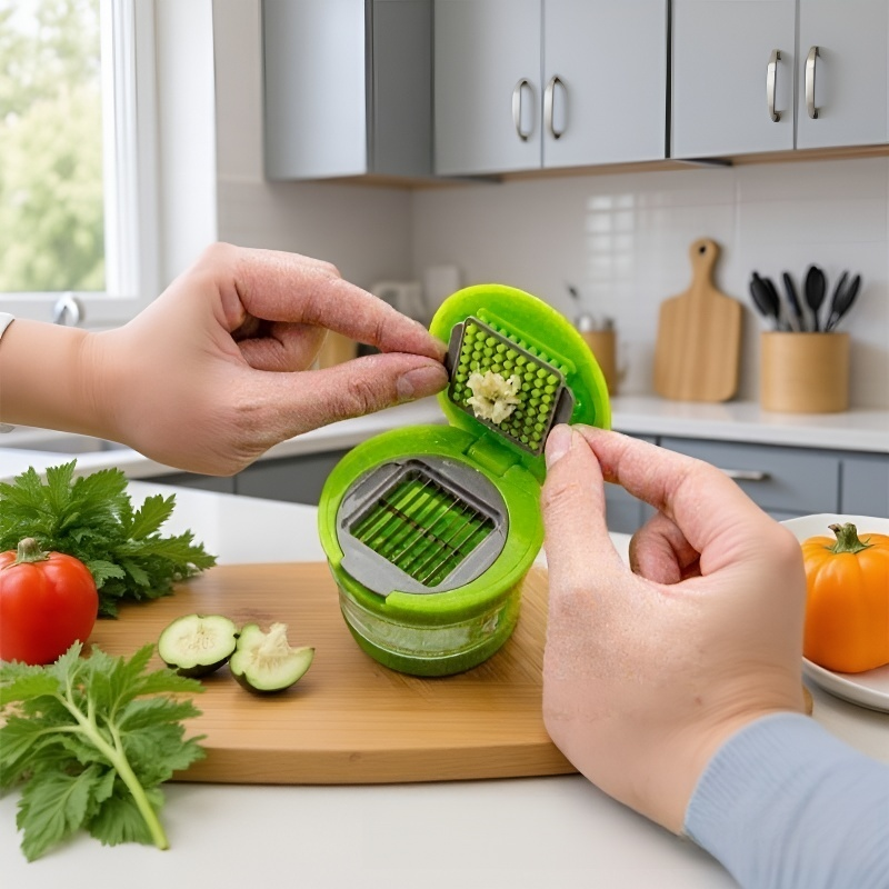 Easy to clean garlic press tool for home cooks